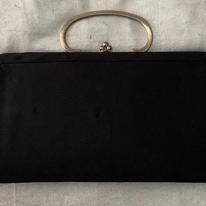 Purse black with brass accents design